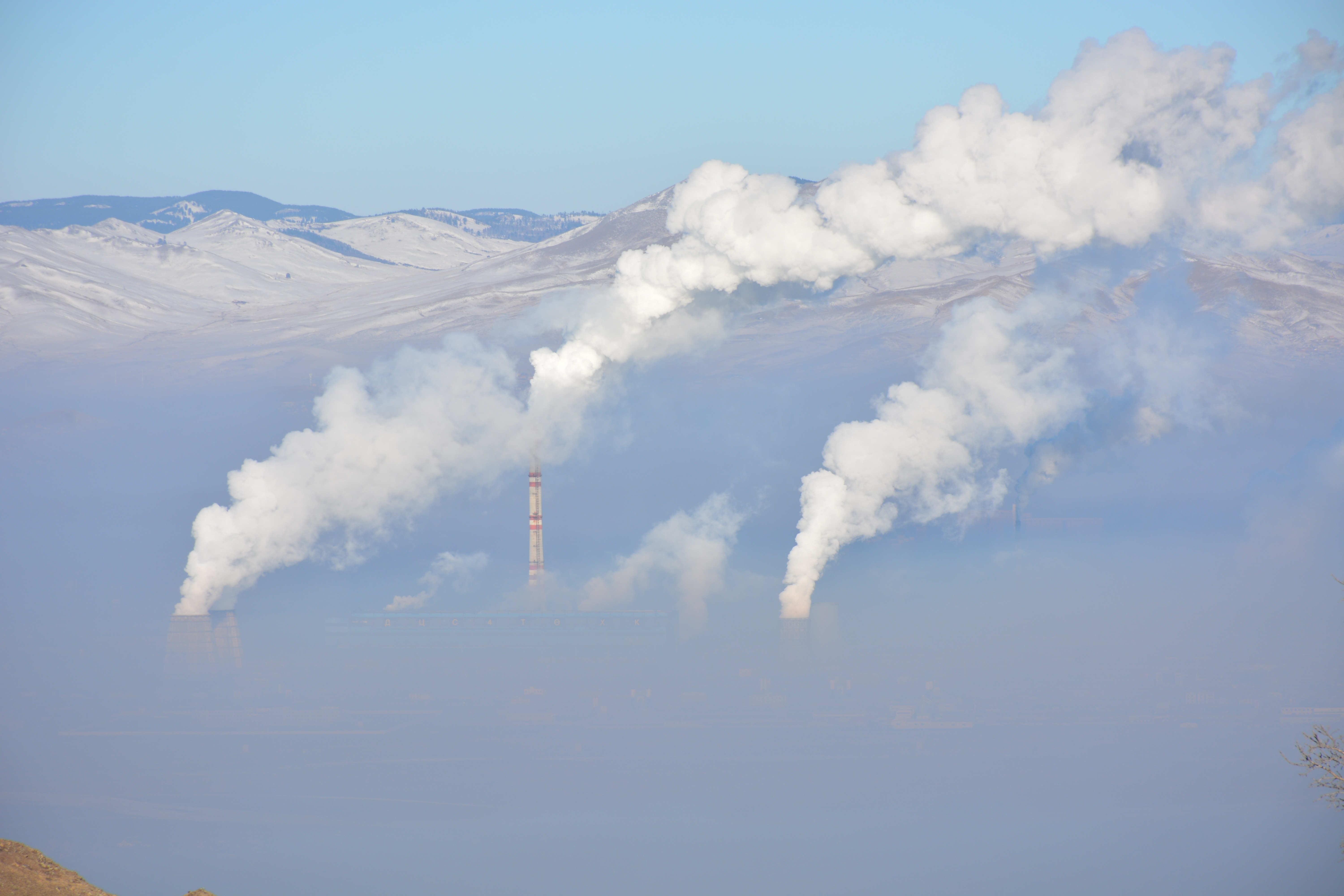 Smoke from industrial chimneys polluting the air